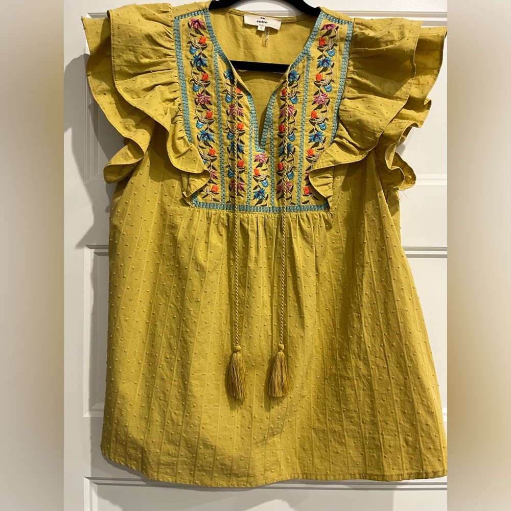 Womens mustard colored short sleeve embroidered blouse.
